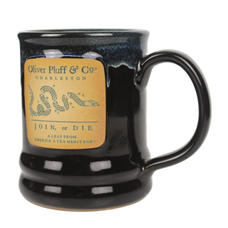 close up view of black and navy mug with join or die emblem on front