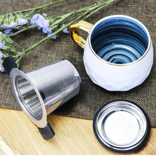 Stainless Steel Brewing Basket - for tea and coffee brewing, a white mug and purple flowers laying on wooden table
