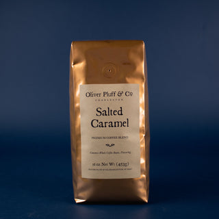 shiny orange coffee bag on blue backdrop