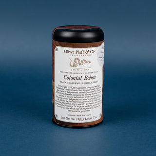 bohea loose commemorative tin on blue background