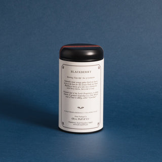 brewing instructions on backside of black tea tin with blue backdrop