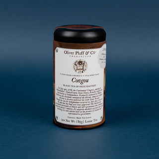 Tea canister with label on a blue background