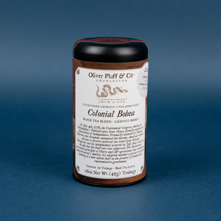 Tea canister with label on a blue background