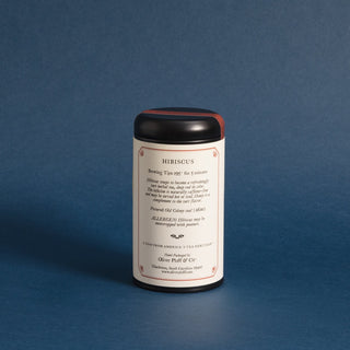 brewing instructions of black tea tin against blue background