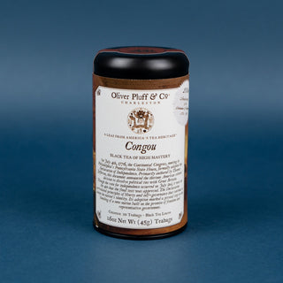 Tea canister with label on a blue background