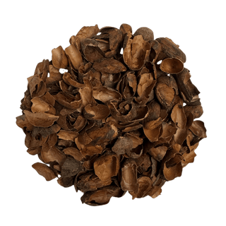 roasted cacao shell loose tea on white background