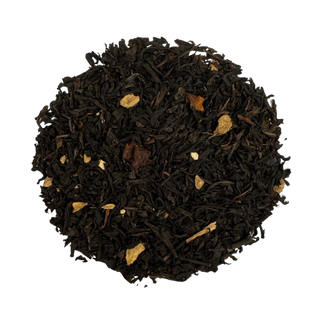 Close-up of black tea leaves on a white background