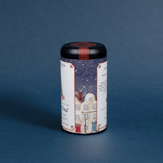Tea canister with decorative label on a blue background