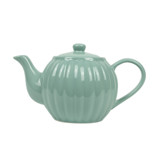Ribbed blue/green tea pot on white background