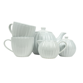 White ceramic tea set with teapot, sugar bowl, and two cups on a white background