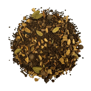 masala chai tea blend including black tea and other herbs on a white background