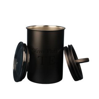Black tea canister with a lid on a white background