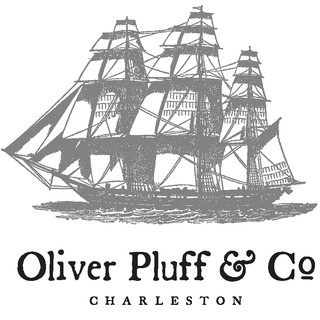 black and white photo of sail boat in the water with OP logo under it