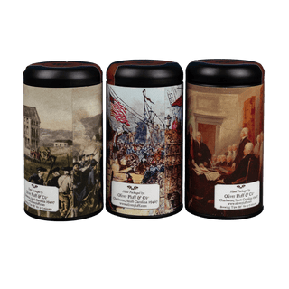 Three cylindrical containers with historical illustrations on their labels 