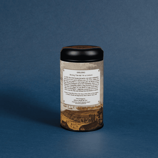 Tea canister with label on a blue background