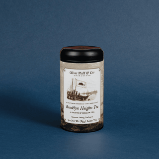 Tea canister with label on a blue background