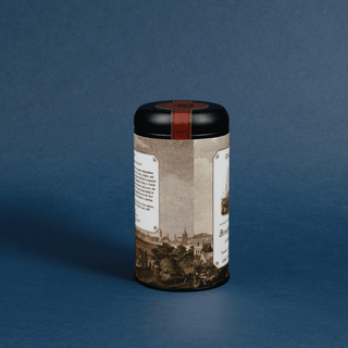 Cylindrical product with decorative label on a blue background