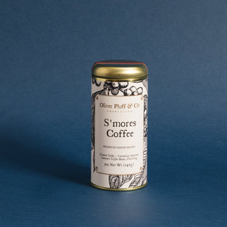 gold coffee tin with blue background