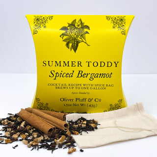 large yellow tea pouch with Cinnamon Sticks, Black Tea, Ginger, Lemon Peel, Cloves, Bergamot sprinkled in front