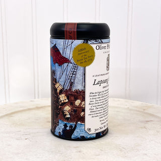 Side view of boston tea party graphic on black tea tin