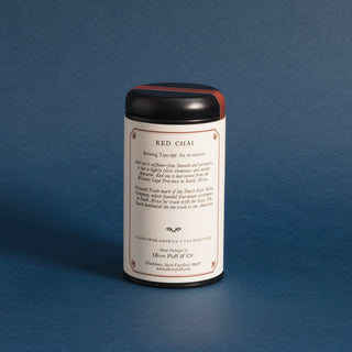 backside of black tea tin with brewing instructions against a blue background