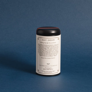 brewing instructions on black tea tin against blue background