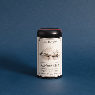 black tea tin with old timey graphic of ships