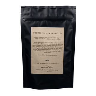 black resealable bag with kraft paper label that reads 'oliver pluff & co' organic black pearl tea