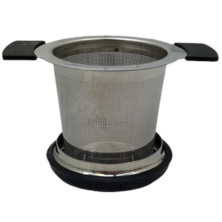stainless steel brewing basket open sitting on top of its lid
