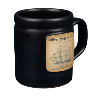 Black mug with a ship label on a transparent background