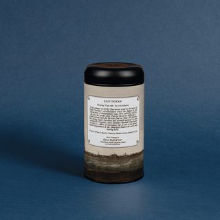 Cylindrical container with a label on a blue background