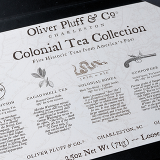 interior card of gift box with white background and black lettering. It reads Colonial Tea Collection and has descriptions for each tea that is included