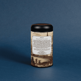Tea canister with vintage design and label on a blue background