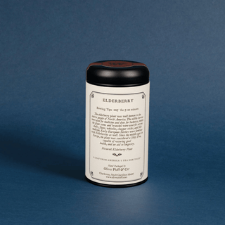 Tea canister with label on a blue background