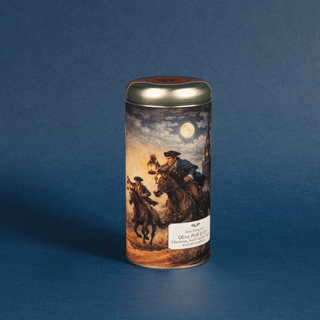 Cylindrical coffee canister with Paul Revere & the midnight riders design on a blue background