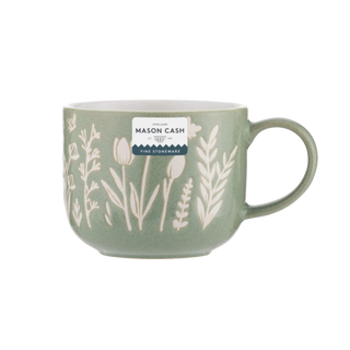 Green mug with floral patterns and Mason Cash label on a white background