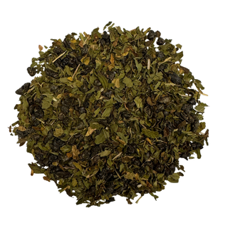 Dry green tea leaves on a white background