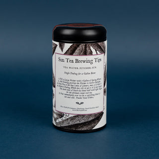 Tea canister with label on a blue background