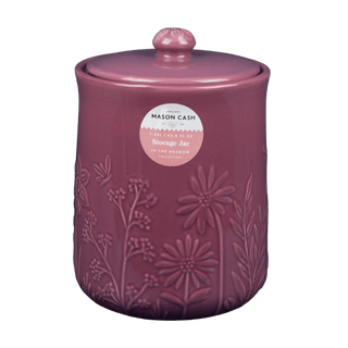Purple storage jar with floral embossing and 'Mason Cash' label on a white background