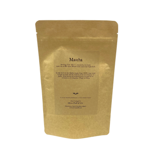 golden yellow tea pouch bag with loose leaf matcha inside