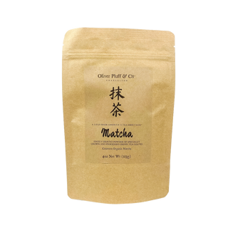 golden yellow tea pouch bag with loose leaf matcha inside