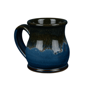 blue, brown, and green mug on clear background