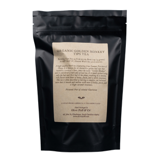 black resealable bag with kraft paper label that reads 'oliver pluff & co' organic golden monkey tips