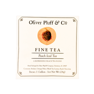 picture of the exterior envelope for 1 gallon peach iced tea packet; says a refreshing black tea blend