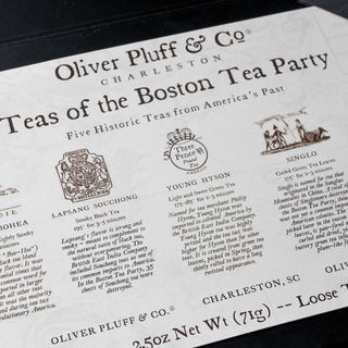 interior card of gift box with white background and black lettering. It reads Teas of the Boston Tea Party and has descriptions for each tea that is included