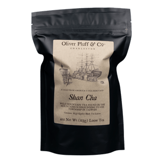 black resealable bag with kraft paper label that reads 'oliver pluff & co' shan cha