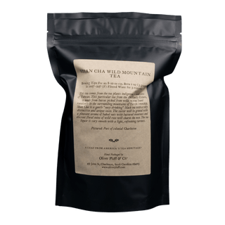 black resealable bag with kraft paper label that reads 'oliver pluff & co' shan cha wild mountain tea