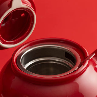 close up view of red tea pot