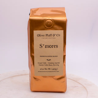 shiny orange coffee bag siting on white plate
